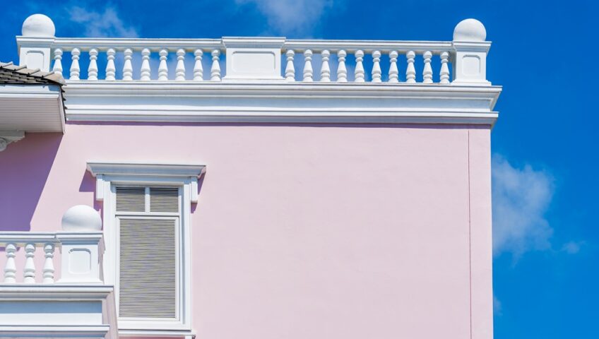 Professional painter in New Jersey helping select the right exterior paint color for a residential home