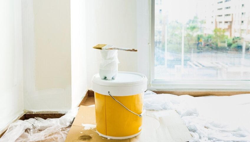 Professional interior painter fixing common painting mistakes in a New Jersey home