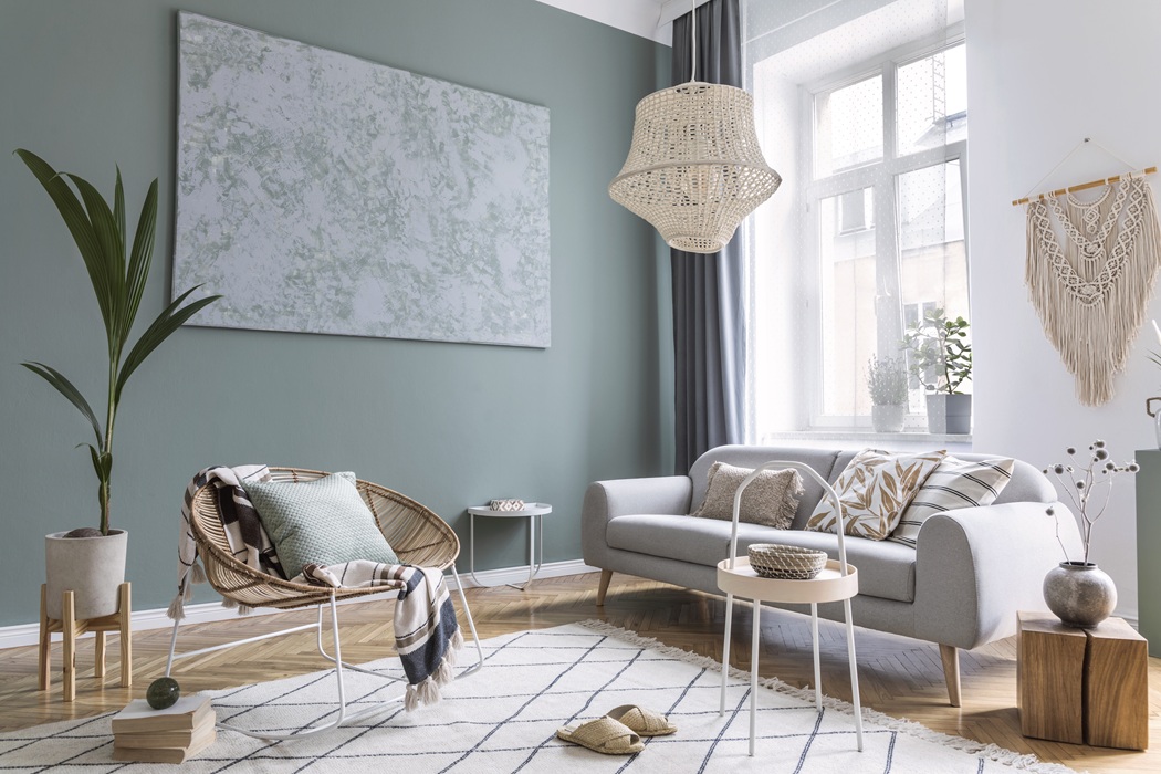 Furniture and floors protected before interior house painting in NJ